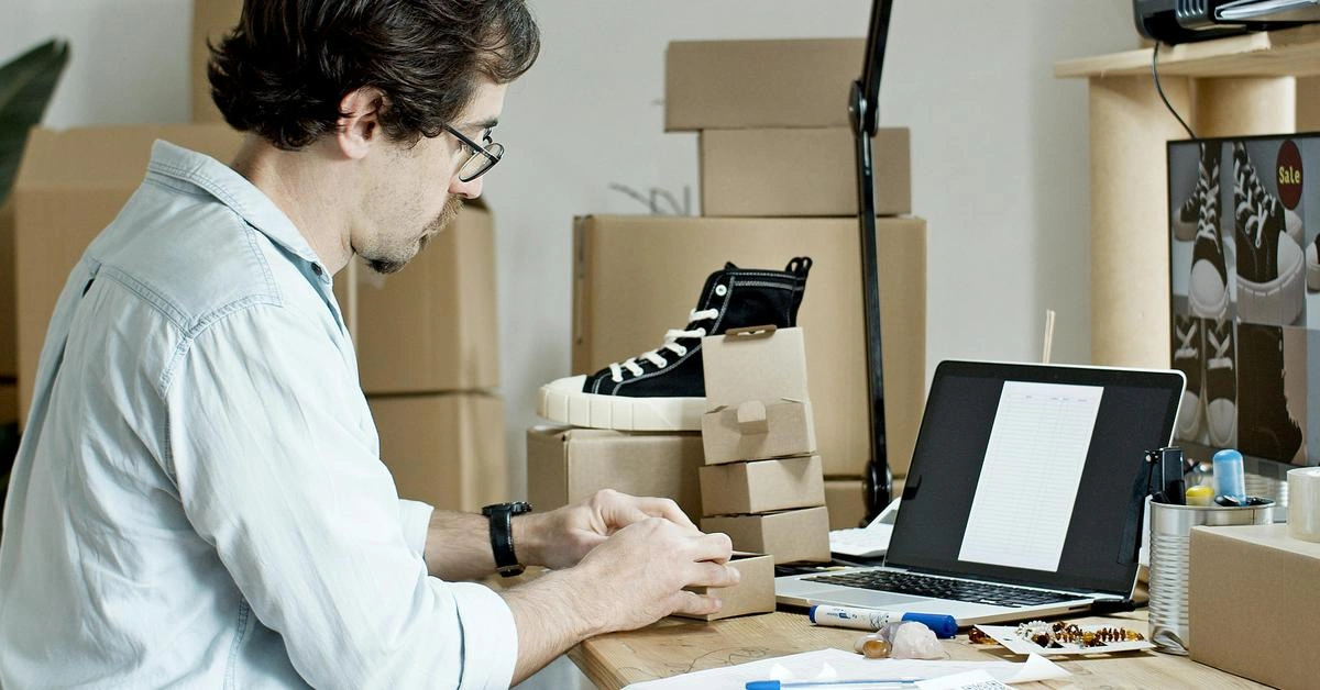 Founder assembling product at a workbench